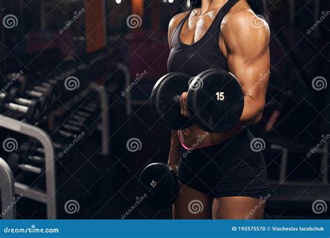 Muscular Lady Lifting Weights At The Gym Stock Photo Image Of Routine Endurance