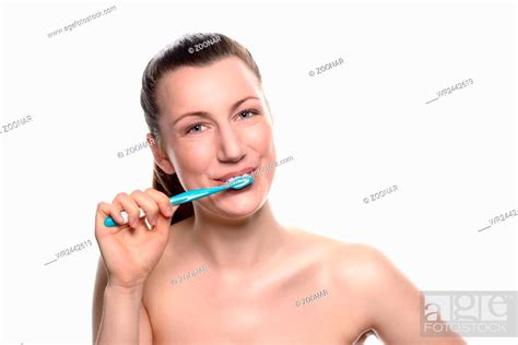 Attractive Naked Woman Brushing Her Teeth Stock Photo Picture And