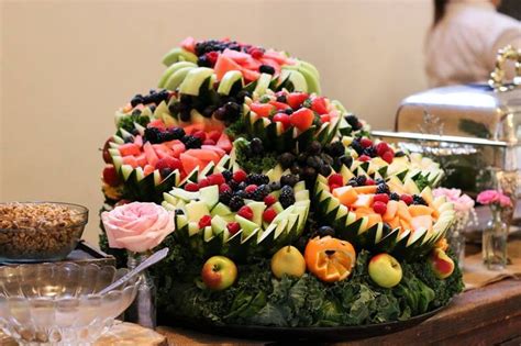 A Platter Filled With Lots Of Fruit And Veggies