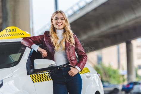 Beautiful Blonde Girl Leaning At Taxi Cab And Smiling Stock Image Image Of Adult Service