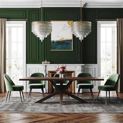 A Dining Room With Green Walls And Chairs