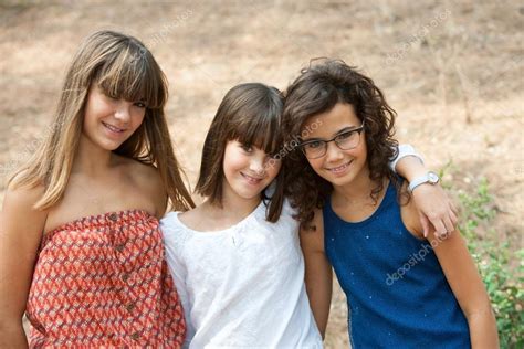 Portrait Of Three Cute Teenage Girls — Stock Photo © Karelnoppe 13137700