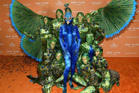heidi klum reveals her 2023 halloween costume a giant peacock entertainment weekly news s
