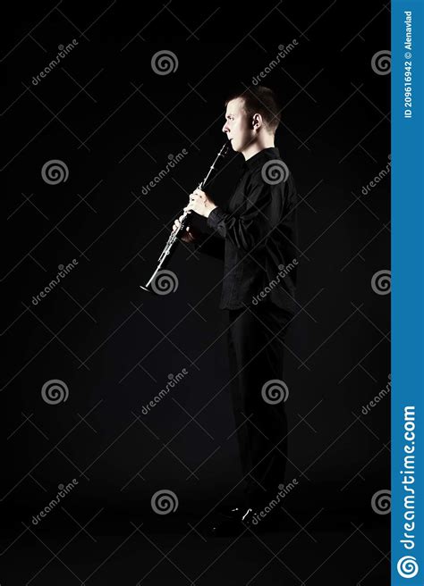 Clarinet Player Classical Musician Man Playing Clarinette Stock Photo