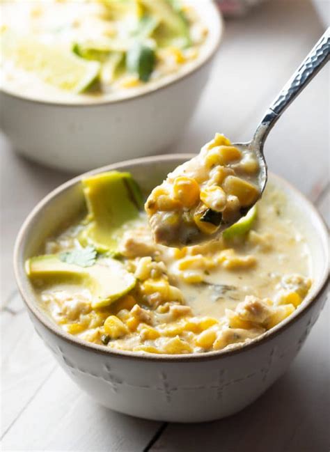 Mexican street corn in a cup, esquites prepared with elote blanco, mexican white corn. Mexican Street Corn Chicken Chili Recipe - A Spicy Perspective
