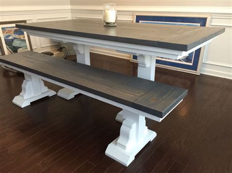 The white of the countertops contrasts 2. This farmhouse table and bench feature a vibrant white ...