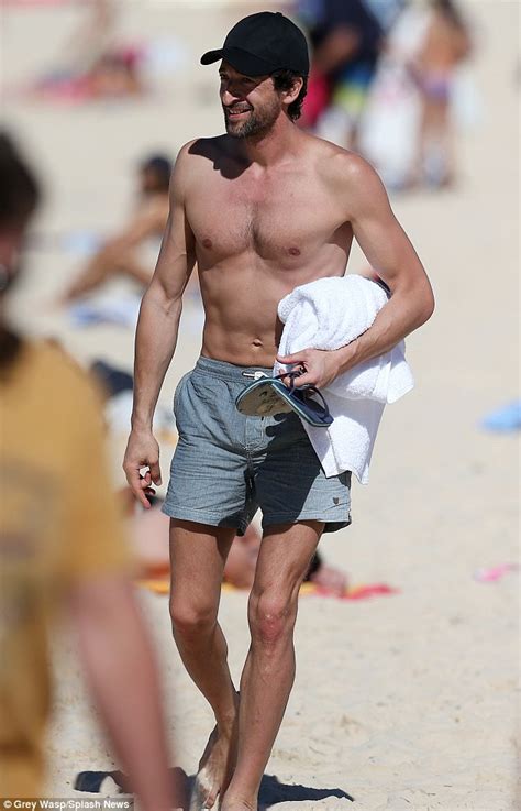 Adrien Brody Chats To Mystery Brunette On Bondi Beach On Break From Filming New Movie Backtrack
