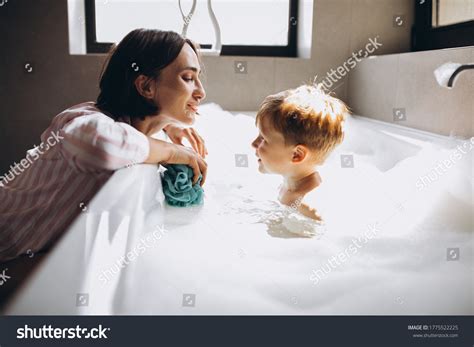 Mom And Son Showering Over Royalty Free Licensable Stock Photos