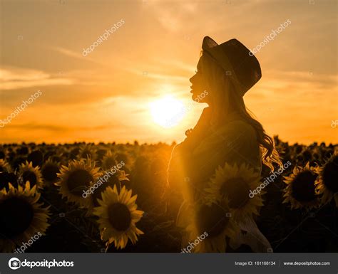 Silhouette Of Young Beautiful Blonde Woman Standing In