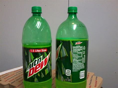 The 15 And 2 Liter Bottles Of Mountain Dew Are The Same Height