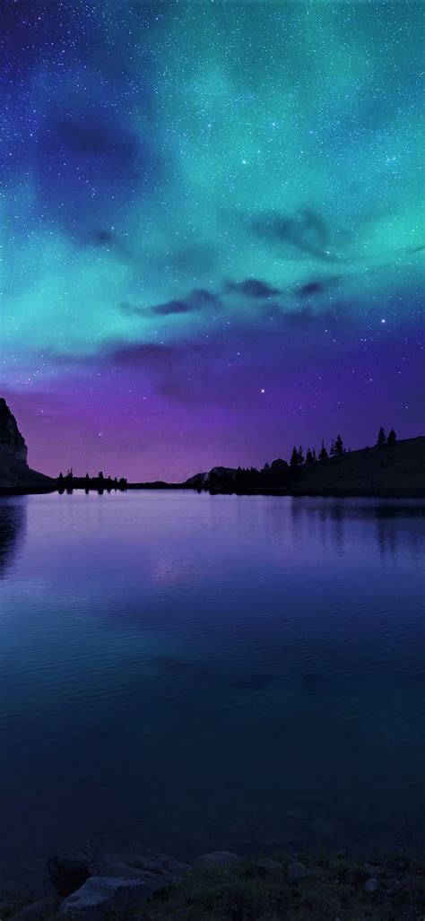 1440x3120 Aurora Borealis Northern Lights Over Mountain Lake 1440x3120