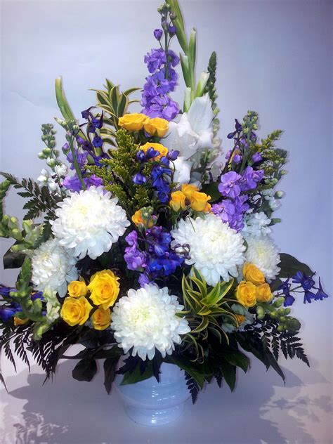 Sending flowers to the family or the funeral home is a great way to show your respect. Sympathy Arrangement - White/Yellow/Purple (Funeral ...