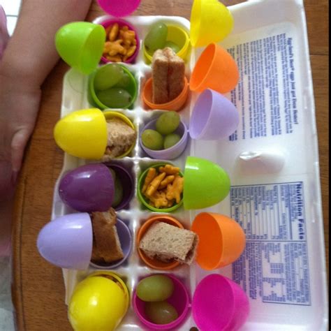 An Egg Tray Filled With Lots Of Different Types Of Food In Small Cups
