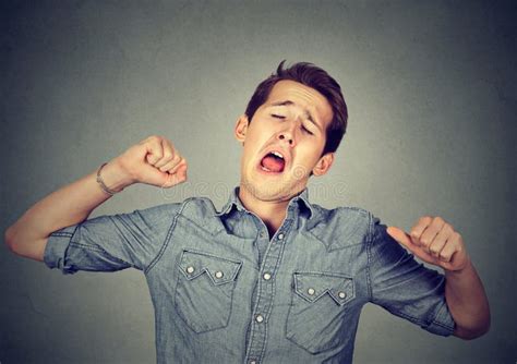 Sleepy Man Yawning Stretching Arms Back Stock Photo Image Of Latin