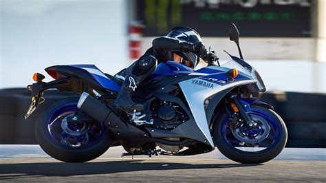 Midnight black, icon blue, electric teal. 2015 Yamaha YZF-R3 announced