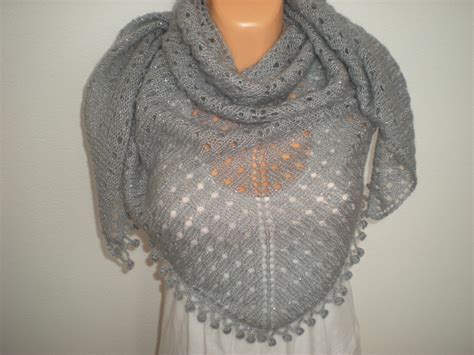 The hood is worked by picking up stitches, knitting several rows and then seaming to finish. EmmHouse: Knitted shawl - free pattern