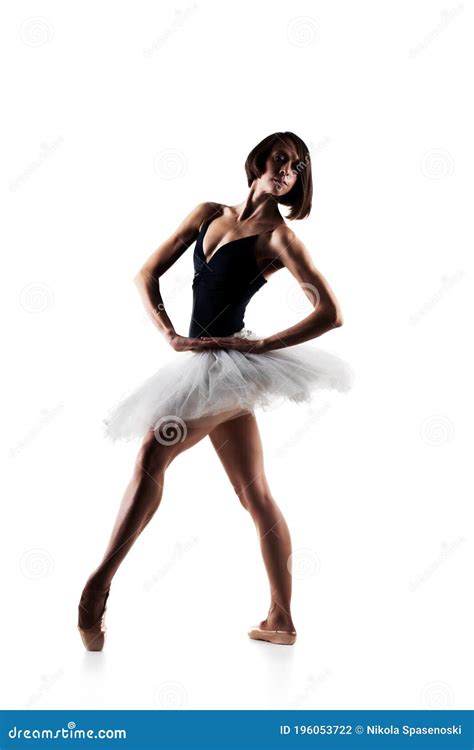 Female Ballet Dancer Wearing Tutu Prima Ballerina Posing On White