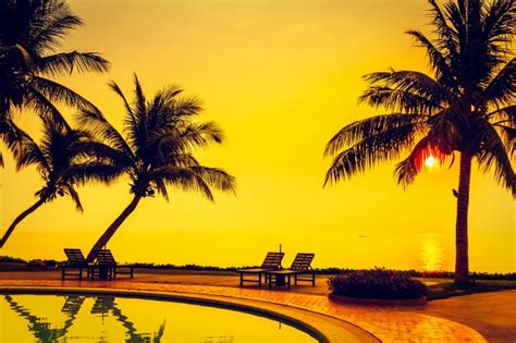 Free Photo Beautiful Sunrise With Silhouette Coconut Palm Tree And