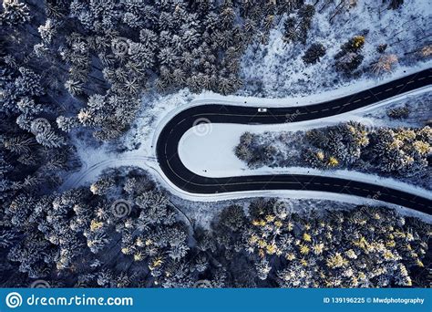 Curved Road In Winter Mountain Landscape Aerial View Of