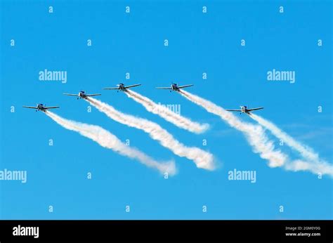 Aerobatic Team Aircraft Fighters Trail Of Smoke In The Sky Stock Photo