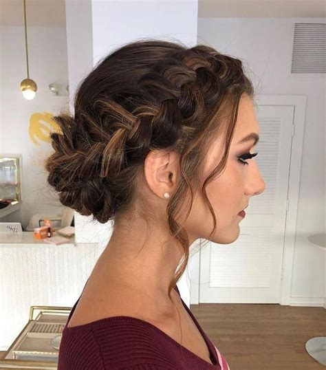 brown hair with highlights in a braided bun wedding hairstyles for medium hair red sweater
