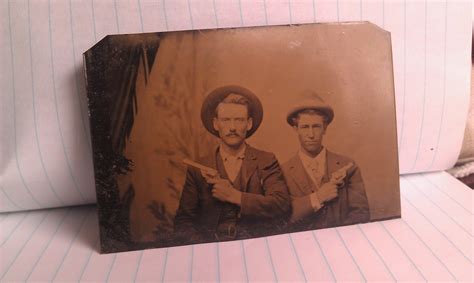 Tintype Cowboysoutlaws Posing With Pistols Drawn Collectors Weekly