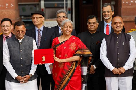 Budget 2023 Nirmala Sitharaman Wears Red Saree With Black And Gold