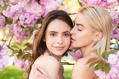 Spring Girls Face Beautiful Sensual Woman In Pink Flowers In Summer
