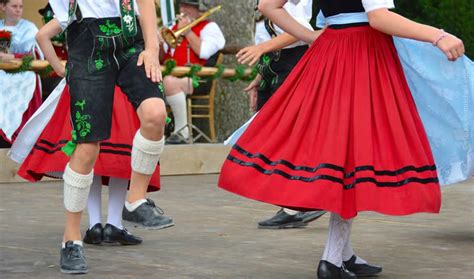 Slap Happy Dancing The Schuhplattler In Bavaria Colorful Dresses Dirndl Dress Folk Dance
