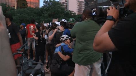 Police Kneel With Protesters To Pray Protest Ends In Hugs Kabb