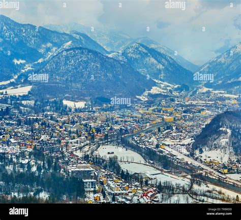 The Snowy Valley Of Bad Ischl With Curved Traun River Amid The Old