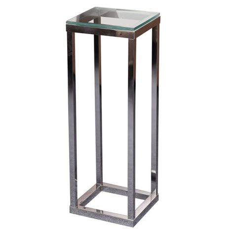 It comes with the stand only and is great to be used in any corner particularly. Modern Chrome Glass Top Pedestal Stand at 1stdibs