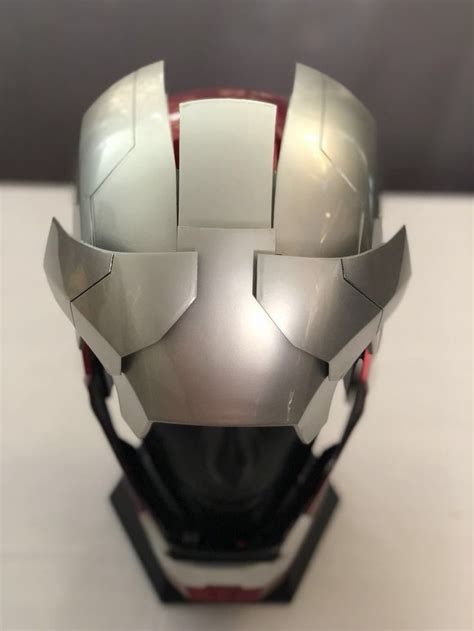 An Iron Man Helmet Is Shown On A Table