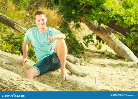 Handsome Man Relaxing On Beach During Summer Stock Photo Image Of