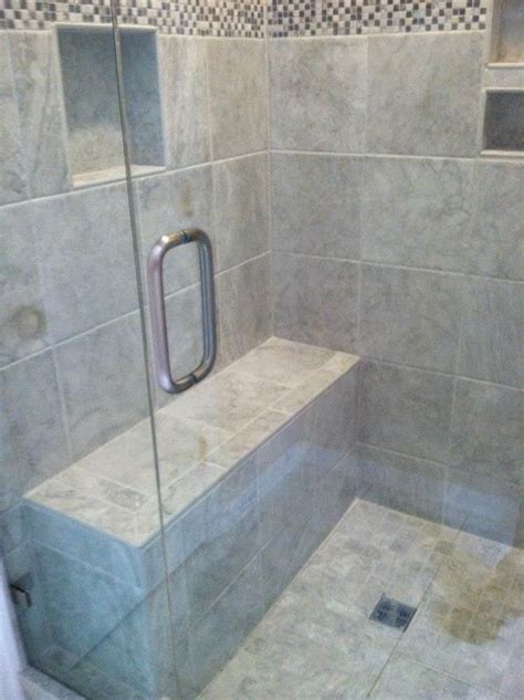 It is an excellent way to add color, beauty, texture, and ambiance to the shower room. Tile shower with bench - bath remodel | Shower tile ...