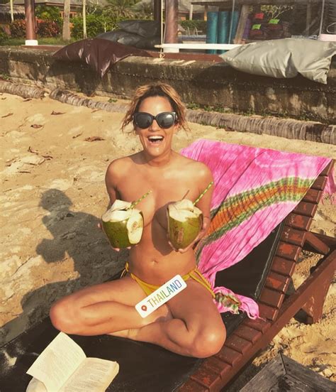 Caroline Flack Goes Topless To Show Off Her Lovely Bunch Of Coconuts As She Continues Lavish