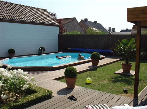 They are more customizable than above ground pools with features such as decking or pavers that can be added to create the appearance of an inground pool but still have a lower cost to build and maintain. Pictures Of Semi Inground Pools With Decks | Pool Design Ideas