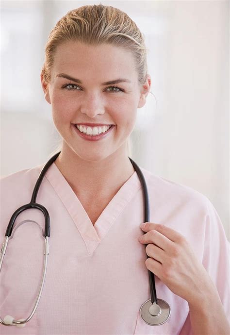 Female Medical Professional Or Doctor Holding Onto Her Stethoscope