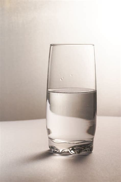 Glass Half Empty Or Glass Half Full Stock Photo Image Of Optimism