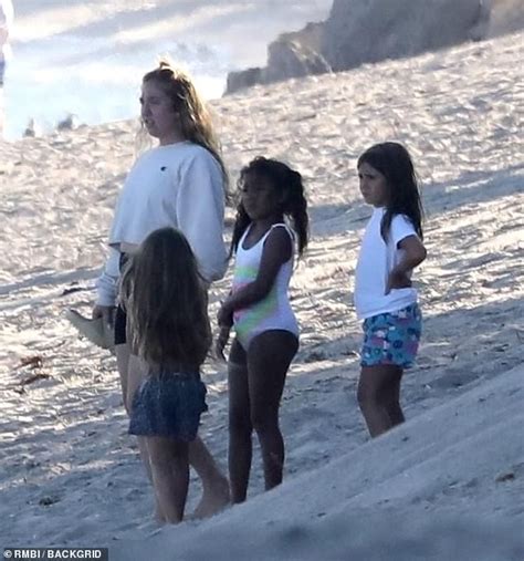 Kourtney Kardashian Flaunts Her Pert Derriere In Bike Shorts At Her Beach House In Malibu