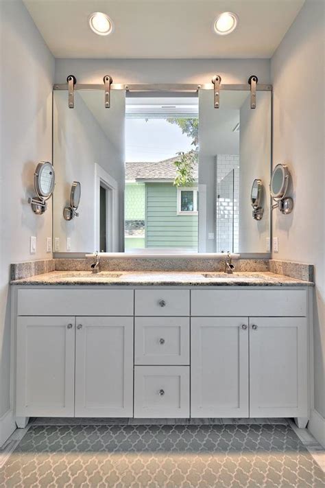 You can also hang this mirror in a bathroom or bedroom to create the illusion of space with the ten mirrored window panes. mirror over window bathroom transitional with two sinks ...