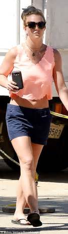 Britney Spears Flashes Toned Midriff In Cropped Tank Top And Shorts
