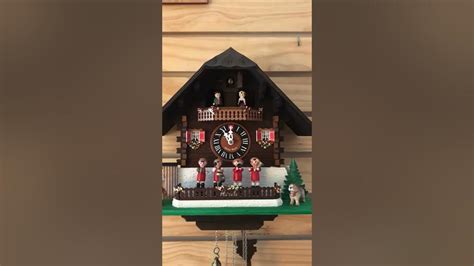 Lotscher Chalet Cuckoo Clock With Musician Playing And Turning