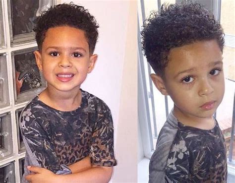 20 Really Cute Haircuts for Your Baby Boy - Kids Hair ... Curly long top and shaved sides.