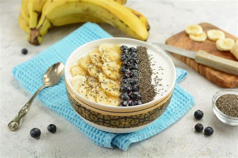 Healthy Protein Greek Bowl With Sliced Banana Blueberries And Chia