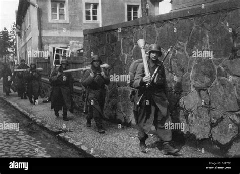 German Wehrmacht Soldiers Armed With Panzerfaust Anti Tank Weapons Move