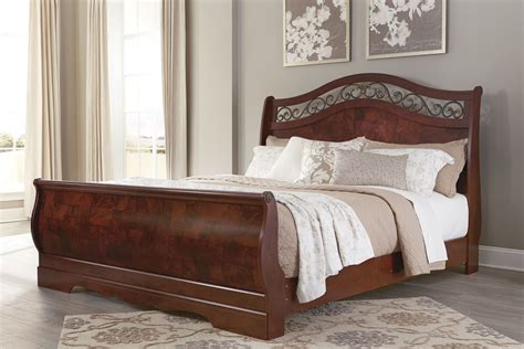 delianna brown king sleigh bed from ashley b223 78 76 97 coleman furniture