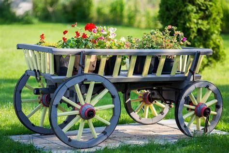 27 Wheelbarrow Flower Planter Ideas For Your Yard Artofit