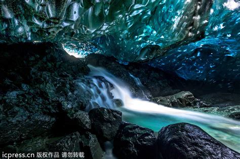Amazing Waterfall Falls Through Ice Caves 1 Cn