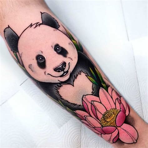 A Panda Bear And Flower Tattoo On The Leg